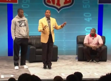 Cris Carter (yellow) and Warren Sapp dispensing their 'advice' to the rookies.
