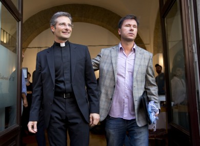 Krzysztof Charamsa, left, and his boyfriend Eduard