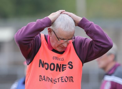 Mickey Moran dejected after watching his side suffer defeat.