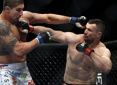 Mirko 'Cro Cop' (right) trades punches with Brendan Schaub during their 2011 bout at UFC 128.