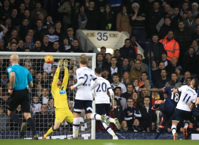 Newcastle United goalkeeper Rob Elliot (second left) saves an effort on goal by Tottenham Hotspur's Erik Lamela (second right).