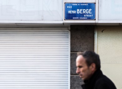 A man walking in the Schaerbeek neighborhood of Brussels over the weekend