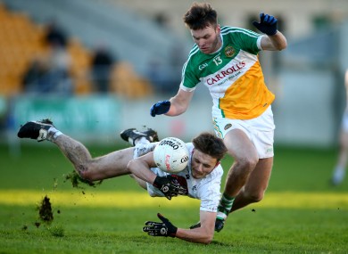 Offaly's Joe Maher and Kildare's Liam Healy in opposition today.
