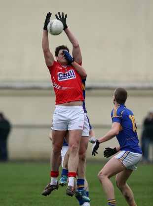 Michael Cussen attempts to field a high ball.