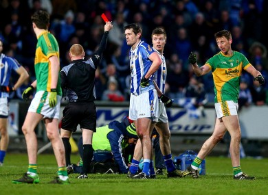 Declan O'Mahony is shown red against Clonmel Commericals.