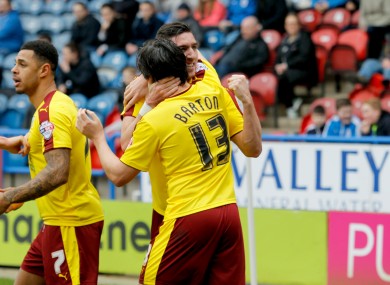 Burnley's Stephen Ward celebrates with Joey Barton after scoring his side's first goal of the game.