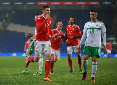 Wales' Simon Church celebrates his late equaliser.