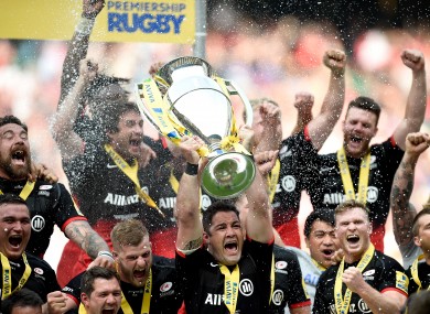 Saracens' Brad Barritt lifts the Aviva Premiership.