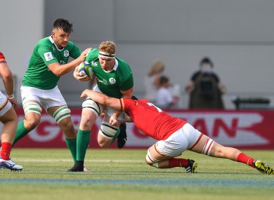 Cillian Gallagher makes a carry.