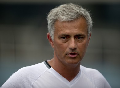 Manchester United manager Jose Mourinho speaks to the media before the team's training session at the Olympic Sports Center Stadium in Beijing.