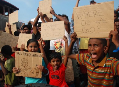 Sri Lankan asylum seekers who were caught in Indonesian waters while trying to sail to Australia.