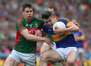 Tipperary's Michael Quinlivan in action against Mayo's Lee Keegan.
