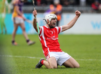 Cuala midfielder Darragh O'Connell celebrates at the final whistle.