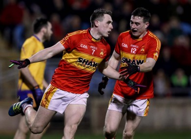 Paddy Durkan celebrates scoring the first goal of the game with James Durkan.