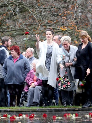 Families gathered outside Farmleigh House at Missing Persons Day 2015.