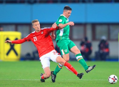 Austria's Marc Janko (left) and Republic of Ireland's Ciaran Clark battle for the ball.
