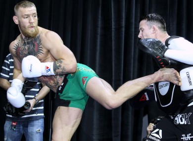 Conor McGregor works out with Owen Roddy prior to his bout against Nate Diaz at UFC 196.
