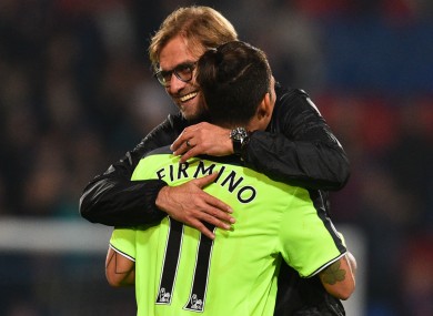 Liverpool manager Jurgen Klopp with Roberto Firmino.