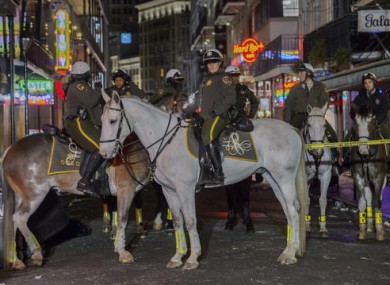 Orleans Parish Sheriff Office mounted patrol block off a crime scene after a fatal shooting in New Orleans.