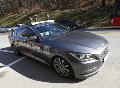 The driverless car called Snuber is test driven during a demonstration at the Seoul National University's campus in Seoul.