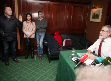 Austin Stack (left), son of Brian Stack, a prison officer murdered in 1983, confronts Sinn Fein leader Gerry Adams (right) during a Sinn Fein press conference at the Davenport Hotel in Dublin.