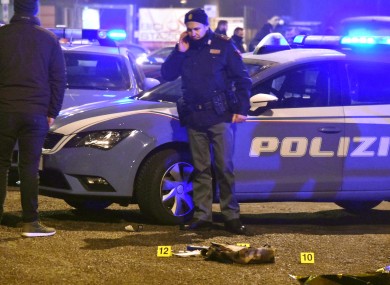 Italian police collecting evidence at the scene where Berlin terror suspect Anis Amri was shot dead by police.