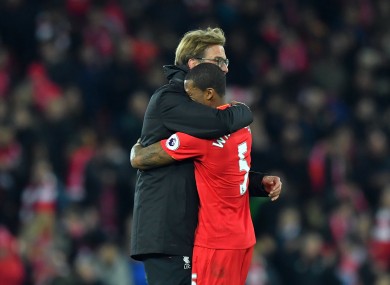 Klopp embraces with his young player at full time.