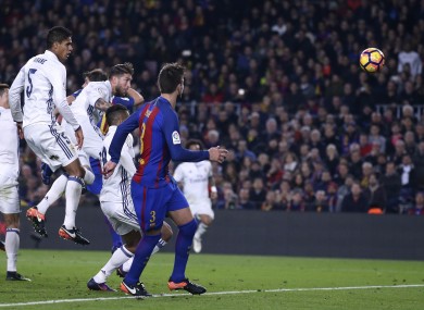 Real Madrid's Sergio Ramos, center left, scores his side's equaliser.