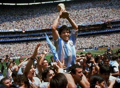 Diego Maradona of Argentina celebrates with the cup at the end of the 1986 World Cup soccer final in the Atzeca Stadium, in Mexico City.