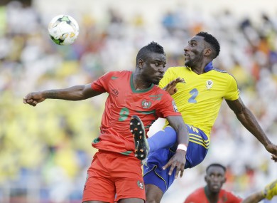 Gabon's Pierre Aaron Appindangoye, right, is challenged by Guinea Bissau's Abel Camara.