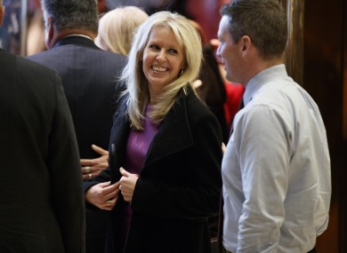 Monica Crowley smiles as she exits the elevator in the lobby of Trump Tower in New York in December.