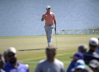 Rory McIlroy, of Northern Ireland, acknowledges the crowd after making a birdie putt on the sixth green during the third round of the Arnold Palmer Invitational golf tournament.
