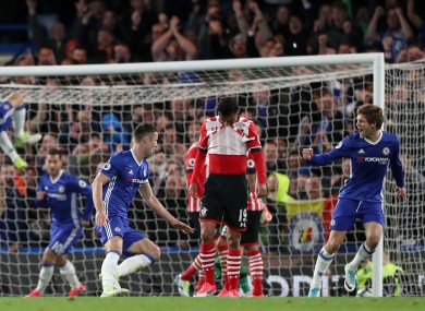 Chelsea's Gary Cahill (centre) scores his side's second goal of the game.
