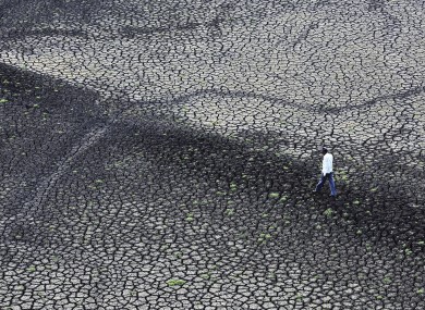 File Photo: dried and cracked dam in India