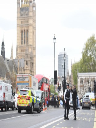 Police at the scene after a person was arrested following an incident in Whitehall in London.