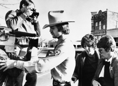 Genene Jones, second right, is escorted into Williamson County Courthouse in Georgetown, Texas in 1984.