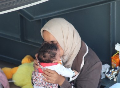 A mother and her child among the rescued.