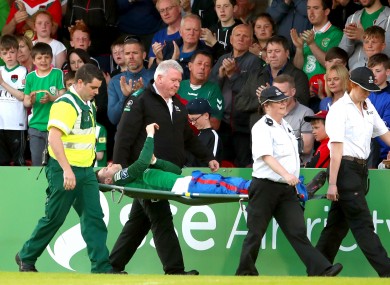 Dunleavy is carried off the pitch on Friday night.