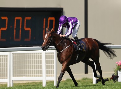Ryan Moore steers Highland Reel over the line.