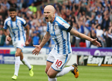 Aaron Mooy celebrates.