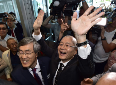 Pastor Hyeon Soo Lim waves to the congregation as he arrives at the Light Presbyterian Church in Mississauga in Ontario yesterday.