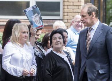 Former West Yorkshire and Merseyside chief constable Sir Norman Bettison (right) walks past Jenny Hicks (left) and other friends and family of victims as he arrives at Warrington Magistrates' Court.
