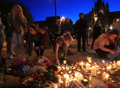 People leave tributes to victims of the Manchester concert bomb attack