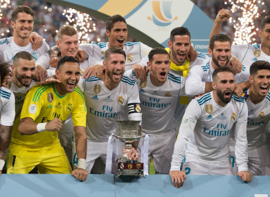 Real Madrid celebrate their Super Cup triumph.