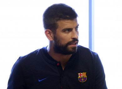 FC Barcelona's Gerard Pique arrives for a press conference.