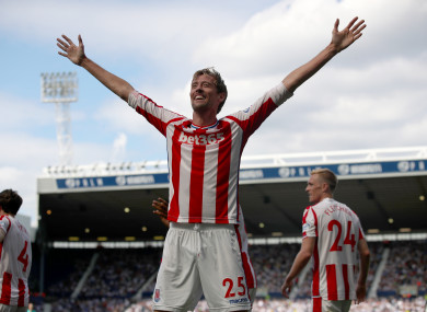 Peter Crouch celebrates his equalising goal.
