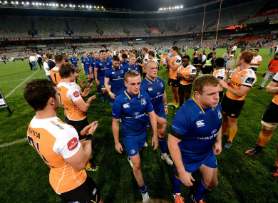 Cheetahs players clap off the Leinster team after the game.