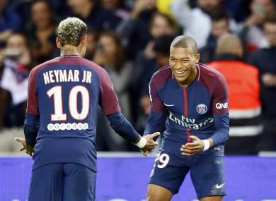 Neymar and Mbappe celebrate.