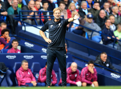 Liverpool manager Jurgen Klopp gestures on the touchline.