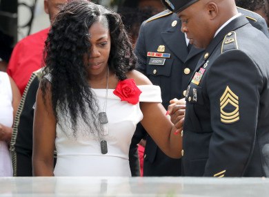 Myeshia Johnson, the wife of Army Sergeant La David Johnson, looks down at his casket during his burial at Fred Hunter's Hollywood Memorial Gardens in Hollywood, Florida.